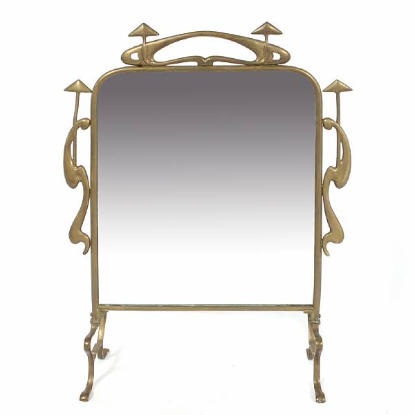 Appraisal: An Art Nouveau brass mirrored fire screen with beveled glass