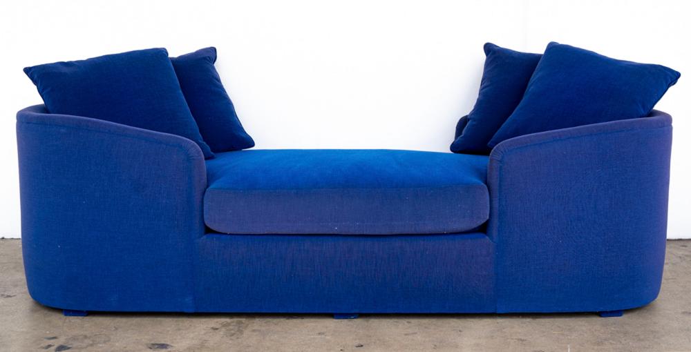 Appraisal: PAIR OF CONTEMPORARY BLUE FABRIC SOFASeach with four matching throw