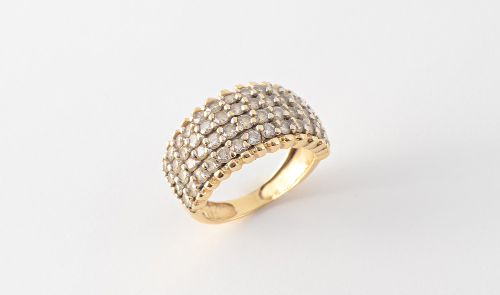 Appraisal: LIGHT BROWN DIAMOND RING K yellow gold ring with rows