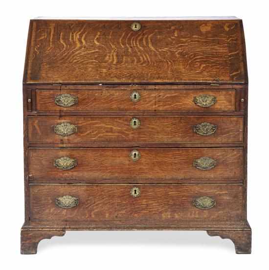 Appraisal: A GEORGE II OAK BUREAU Fall front opening to interior