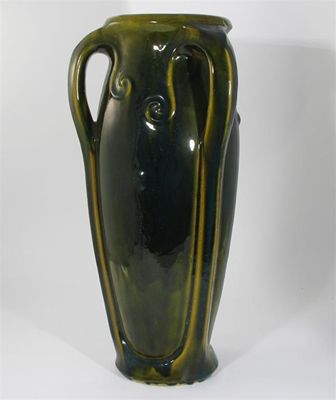 Appraisal: A large Art Nouveau stoneware floor vase cast with three