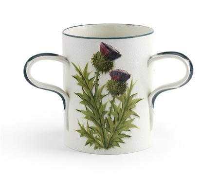 Appraisal: WEMYSS THREE-HANDLED MUG EARLY TH CENTURY decorated with thistles impressed