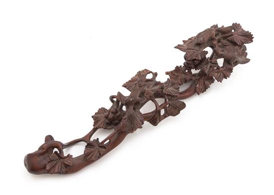 Appraisal: Sale Lot A Carved Wood Ruyi Scepter depicting squirrels climbing