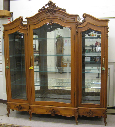 Appraisal: LOUIS XV STYLE THREE-DOOR ARMOIRE French early th century converted