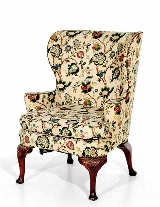 Appraisal: Carved mahogany barrelback wing chair in the Queen Anne tradition