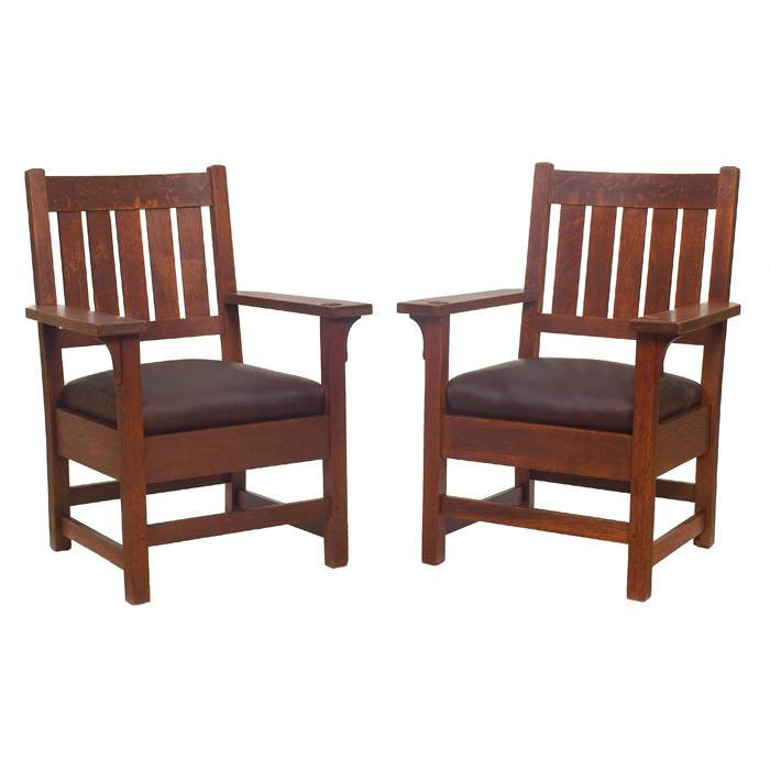 Appraisal: Gustav Stickley armchairs pair five vertical slats to back over