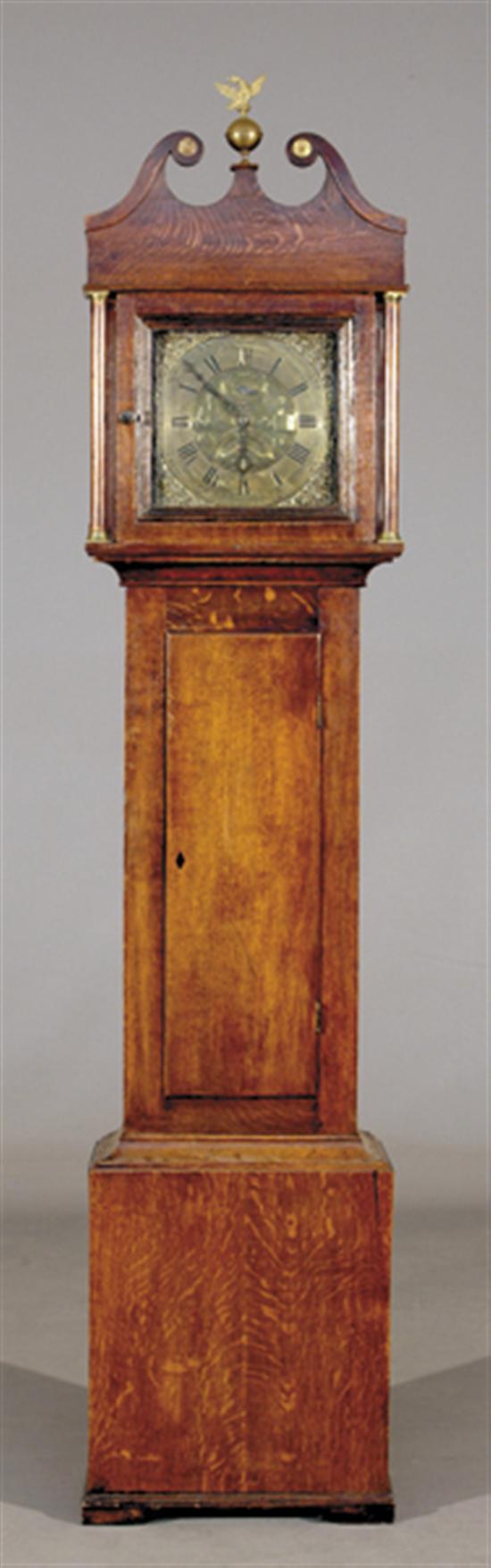 Appraisal: English oak tall case clock circa broken arch pediment centering