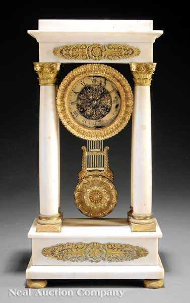 Appraisal: A Napoleon III Gilt Bronze and Marble Portico Clock th