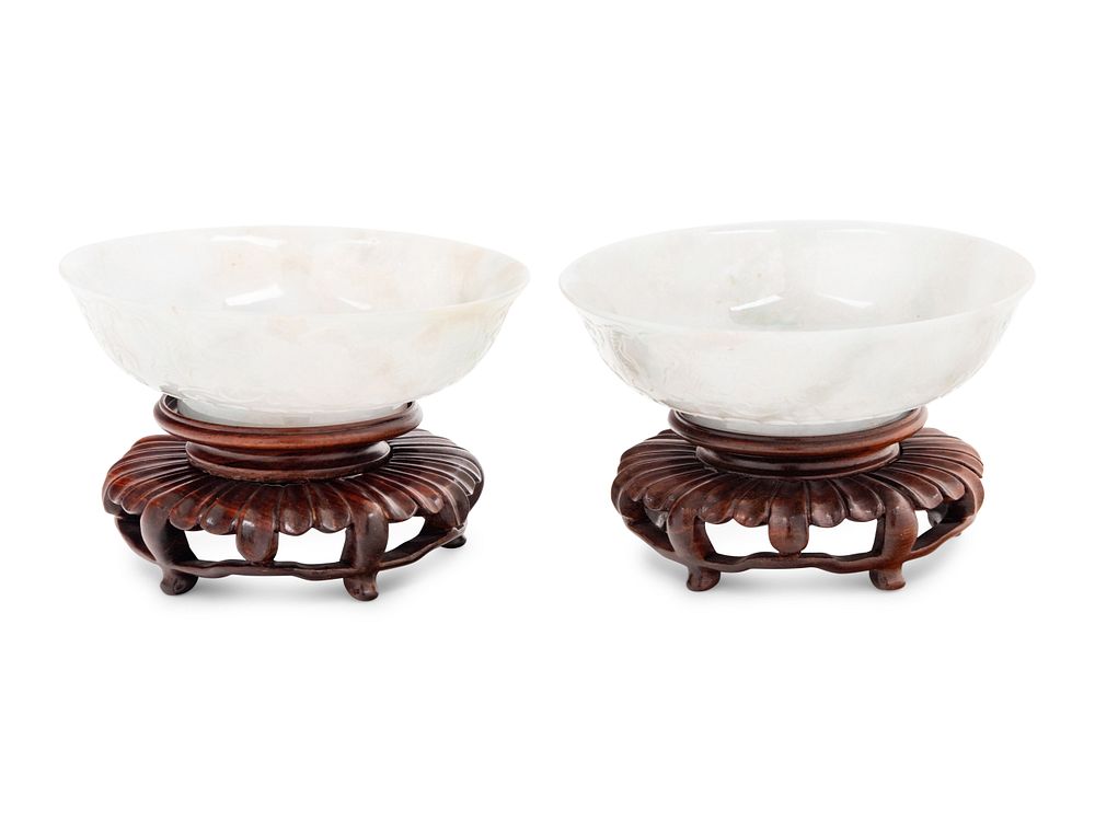 Appraisal: A Pair of Chinese White Jadeite 'Lotus' Bowls A Pair