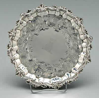 Appraisal: George III English silver salver round with three paw feet