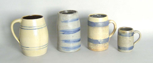 Appraisal: Three stoneware mugs together with a small crock