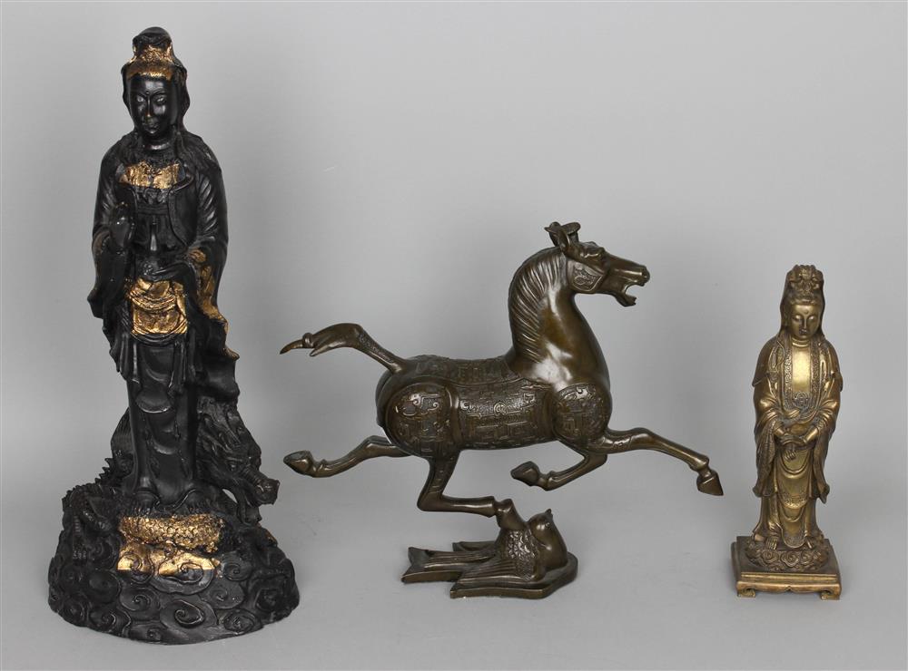 Appraisal: TWO CHINESE BRONZE FIGURES OF GUANYIN the first of Guanyin