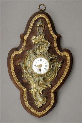 Appraisal: Louis XV-Style Gilt-Metal Cartel Clock Mounted on leather-covered panel dial