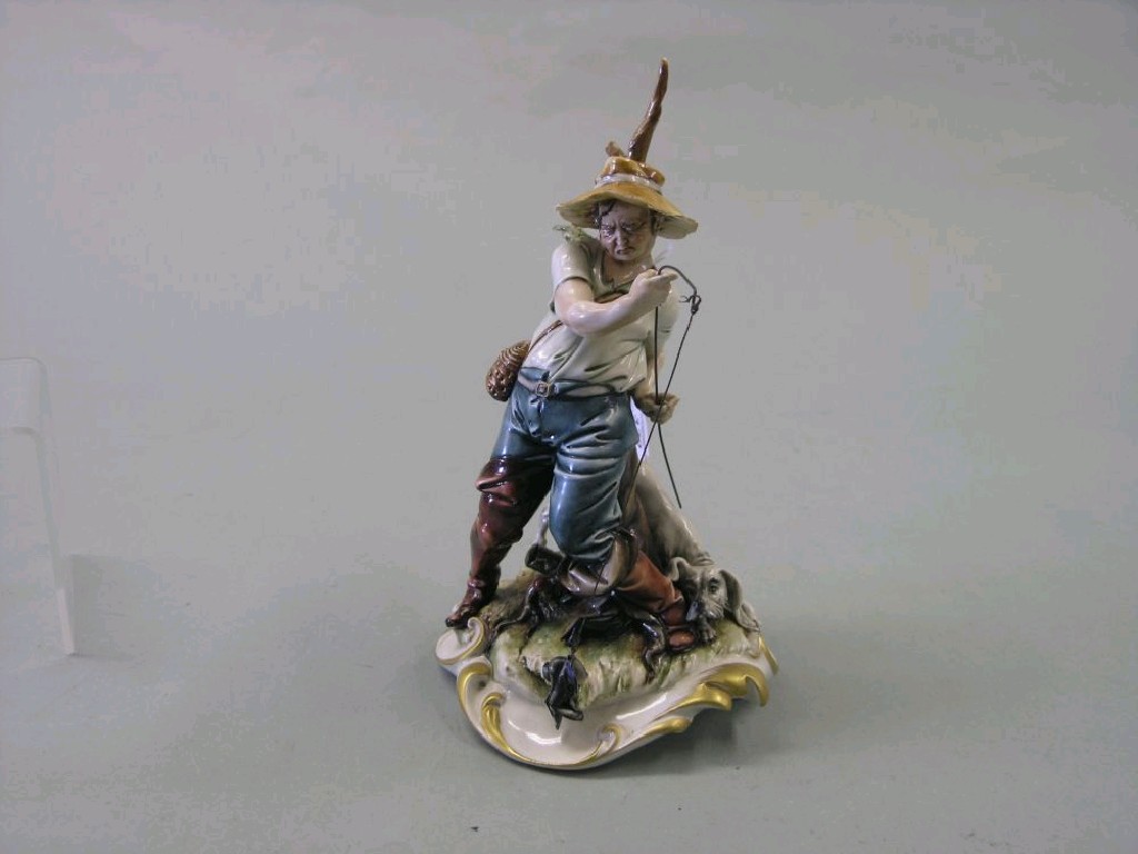 Appraisal: A Capodimonte porcelain model of a fisherman comical scene on