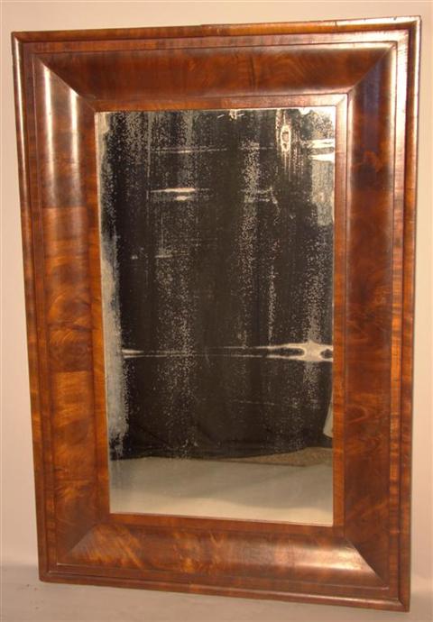 Appraisal: AMERICAN EMPIRE MAHOGANY MIRROR The rectangular molded frame enclosing a