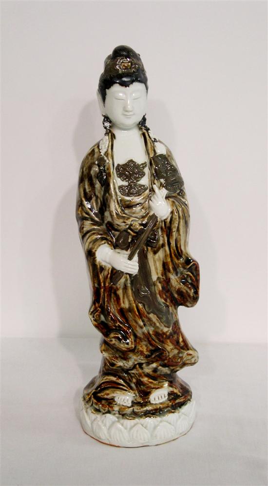 Appraisal: Porcelain figure Asian th C depicting Kannon Guanyin standing mottled