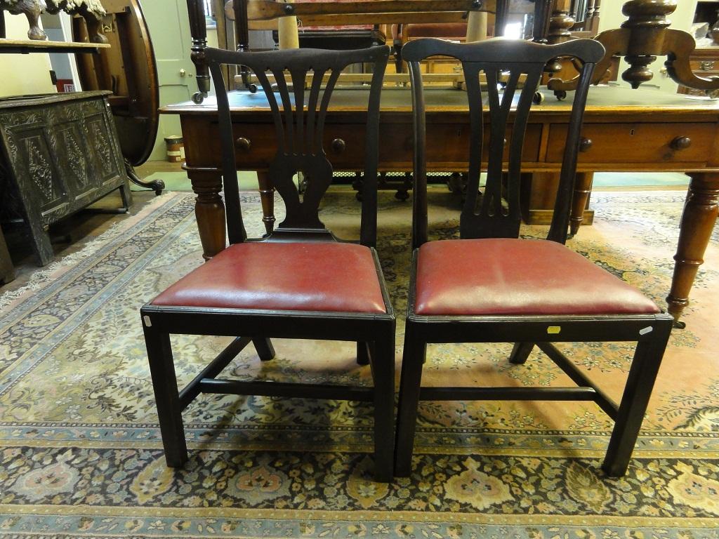 Appraisal: Two Georgian mahogany dining side chairs with pierced central splats