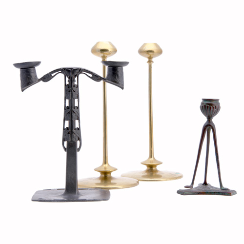 Appraisal: TIFFANY JARVIE KNOX Four candlesticks Tiffany Studios bronze tripod candlestick