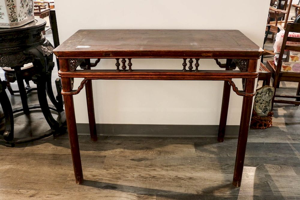 Appraisal: RED LACQUERED HARDWOOD TABLE TH C Of rectangular top with