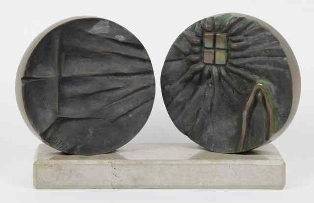 Appraisal: A modern sculpture two circular embossed bronze discs on a