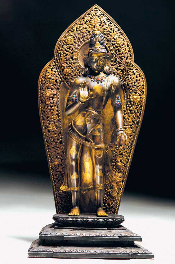 Appraisal: NEPALESE GILT COPPER FIGURE Nepalese gilt copper Buddhist figure of