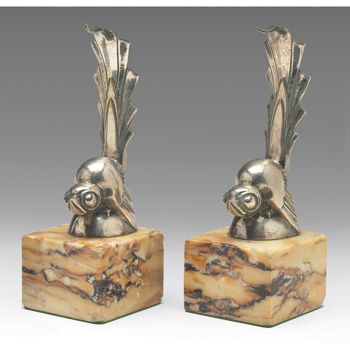 Appraisal: C Rischman bookends pair silver grouse with high tail feathers