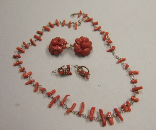 Appraisal: A pair of Victorian carved coral earrings each in a