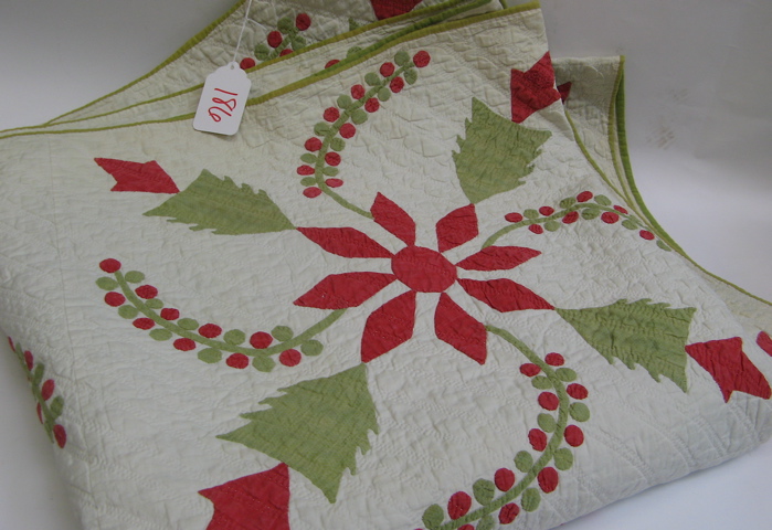 Appraisal: AMERICAN HANDMADE COTTON APPLIQUED QUILT in the Holly Berry pattern