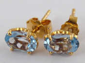 Appraisal: A pair of yellow metal tests carat gold blue topaz