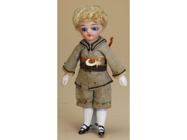 Appraisal: All Bisque Boy Germany ca all bisque with swivel neck