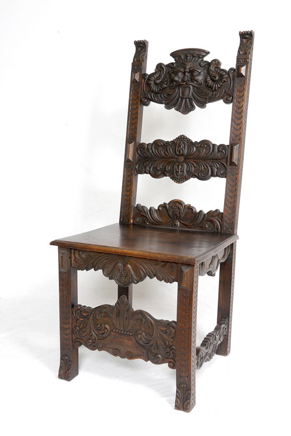 Appraisal: th C CARVED MAHOGANY THRONE SIDE CHAIR Highly carved splats