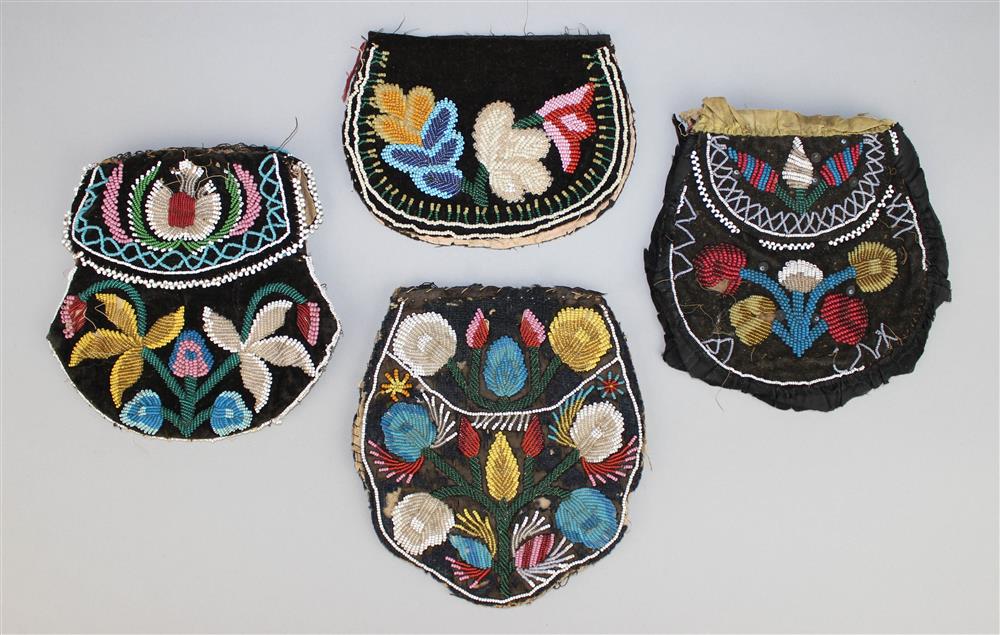 Appraisal: FOUR NORTHEAST BEADED TRADE CLOTH POUCHES IROQUOIS each decorated in