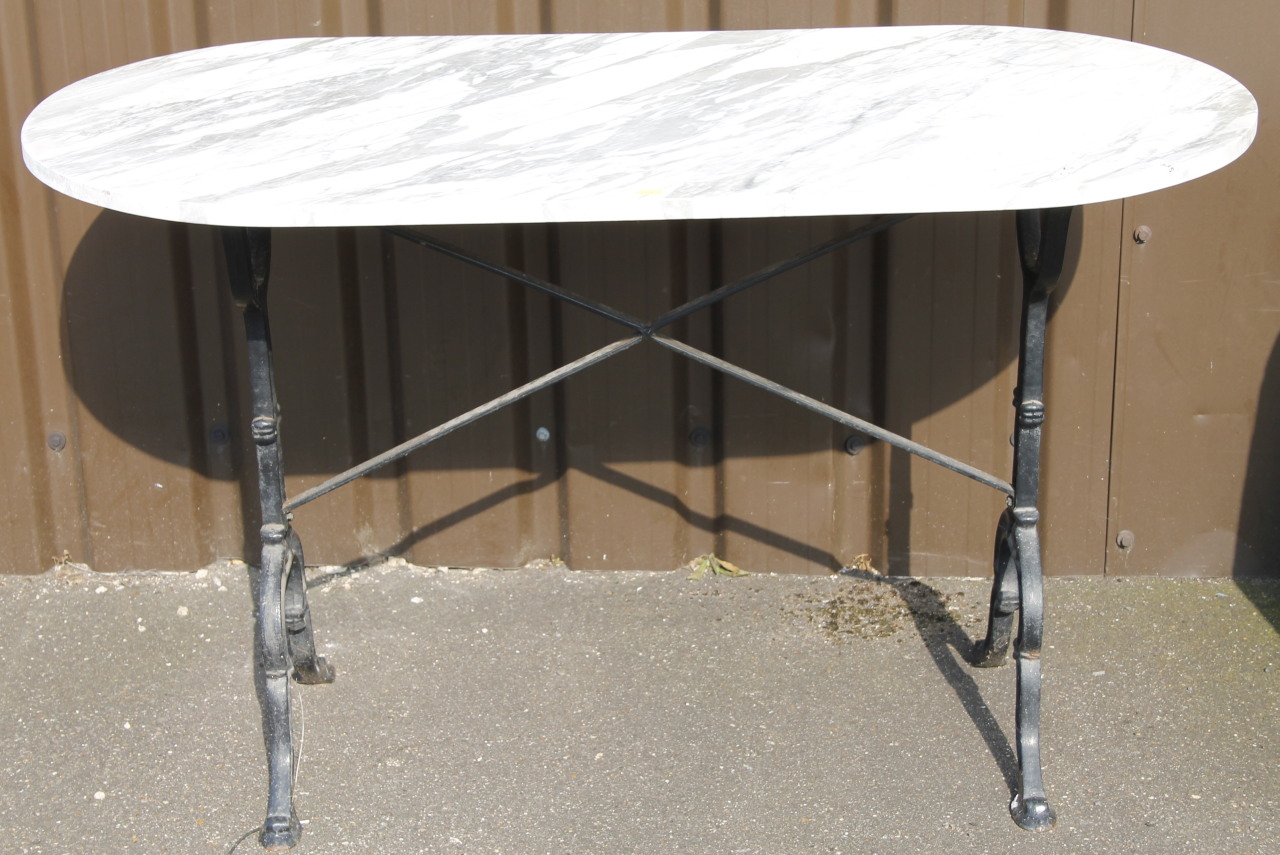 Appraisal: A thC iron and marble finish serving table the oblong