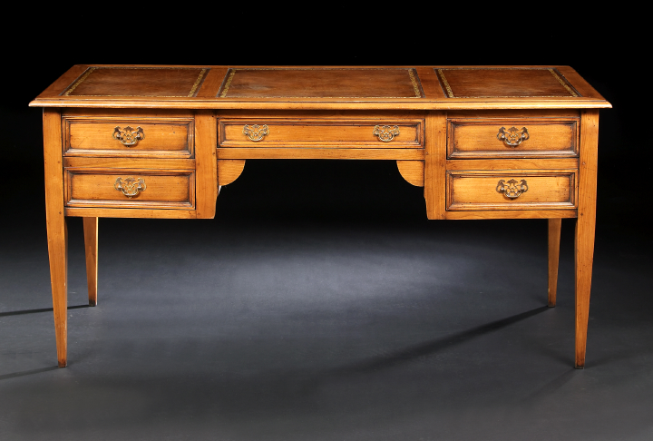 Appraisal: Louis XVI-Style Fruitwood Desk the rectangular top trisected and with