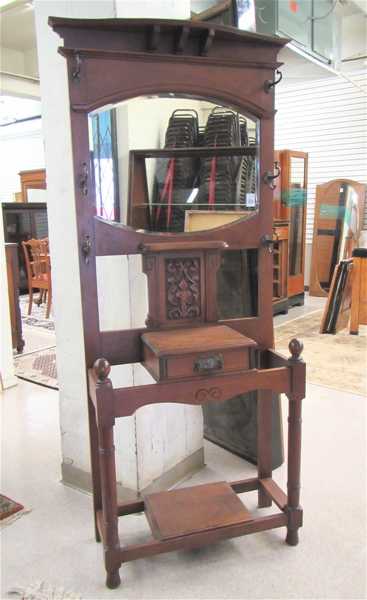 Appraisal: LATE VICTORIAN WALNUT AND MAHOGANY HALLSTAND English c with inset