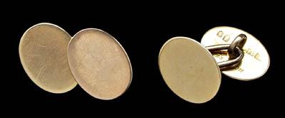 Appraisal: Pair vintage gold cufflinks plain oval panels British style marks