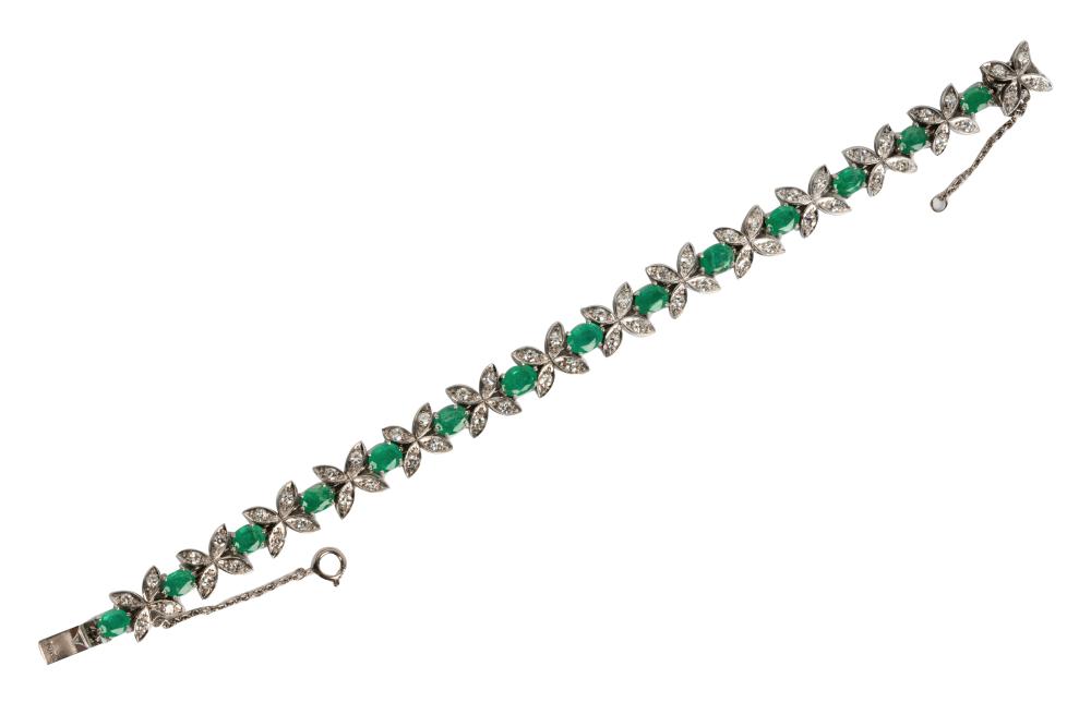 Appraisal: KARAT WHITE GOLD DIAMOND EMERALD BRACELETcontaining oval cut emeralds weighing