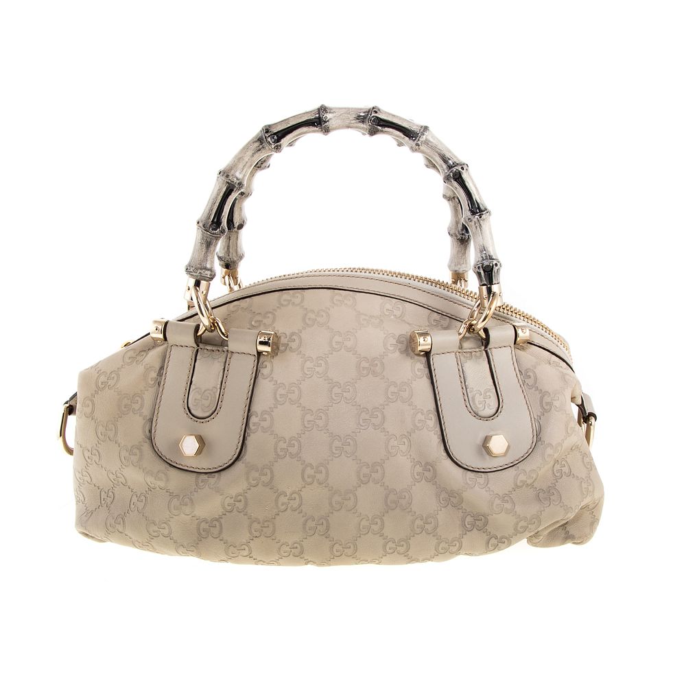 Appraisal: A Gucci Bamboo Top Handle Bag An ivory calf leather