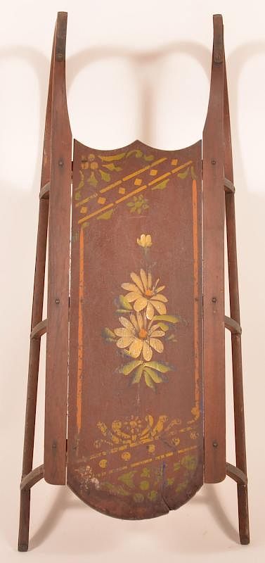 Appraisal: Childs sled having floral and stencil motif over brown paint