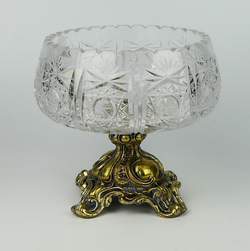 Appraisal: HEAVY CUT CRYSTAL AND BRASS CENTER BOWL Bowl is cut