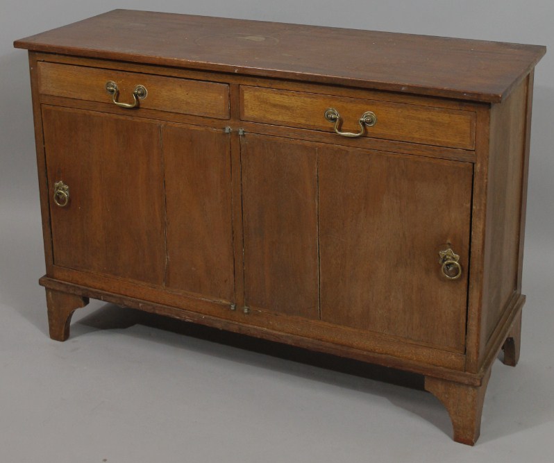 Appraisal: A thC mahogany side cabinet the rectangular overhanging top raised