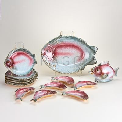 Appraisal: ITALIAN STUDIO POTTERY Fifteen piece fish set platter covered sauce