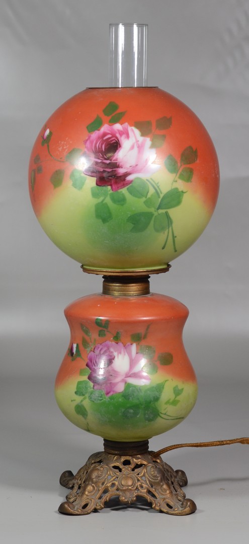 Appraisal: Gone with the Wind lamp shade base painted with roses