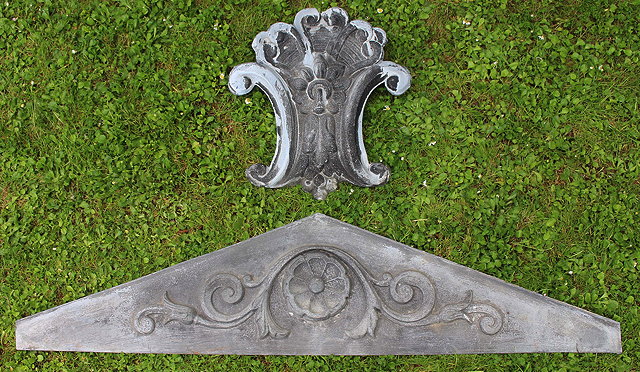 Appraisal: A ZINC ARCHITECTURAL ORNAMENT of pointed form with scrolling acanthus