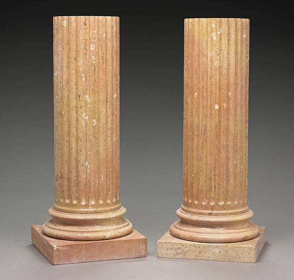 Appraisal: A pair of Neoclassical style fluted marble pedestals modern Each