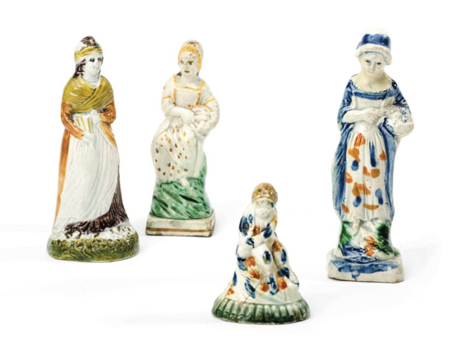 Appraisal: FOUR STAFFORDSHIRE PEARLWARE quot TOYS quot AND FIGURES CIRCA -