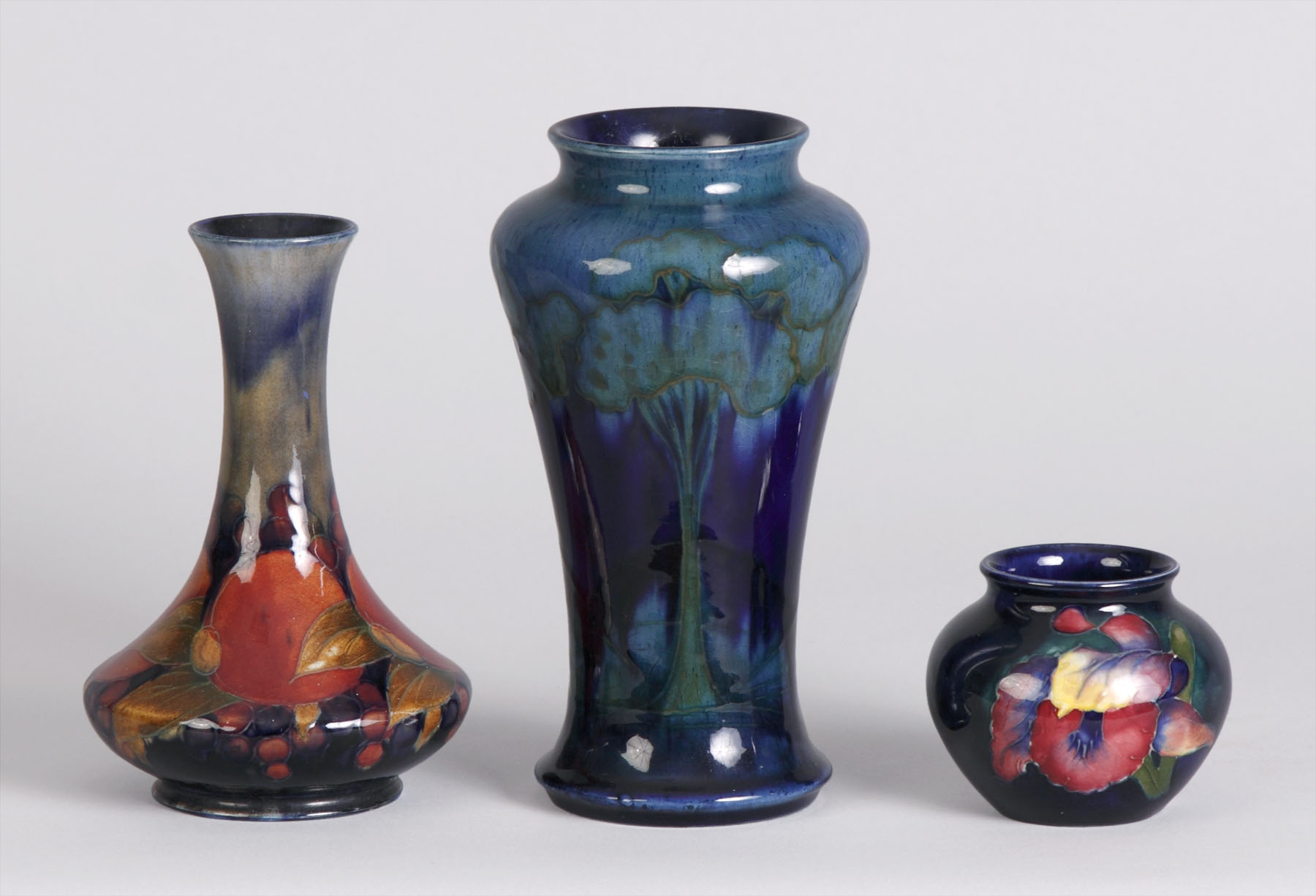 Appraisal: Sgn Moorcroft Vases - L R L Pomegranate Some crazing