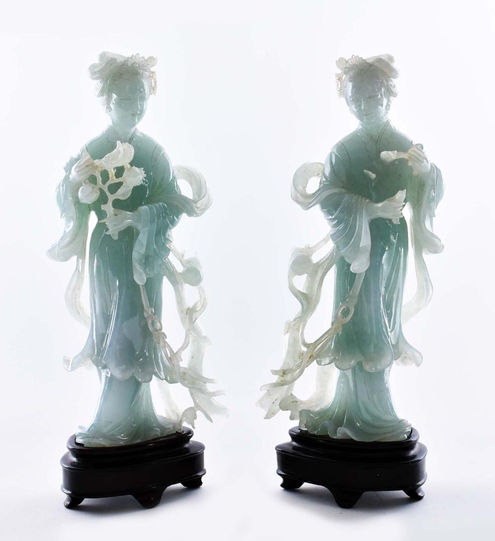 Appraisal: PAIR OF CHINESE JADE FIGURES OF QUAN YINEach elegant transparent