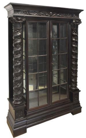 Appraisal: Spanish Renaissance Revival ebonized display cabinet early th c molded