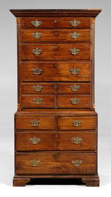 Appraisal: English oak chest on chest oak throughout two-case construction upper